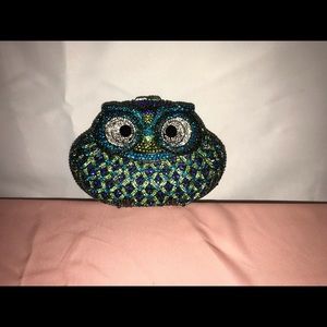Multicolored owl clutch